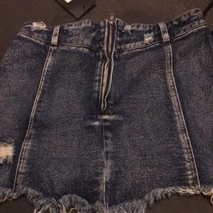 signature8,size small, and blue skirt jean.